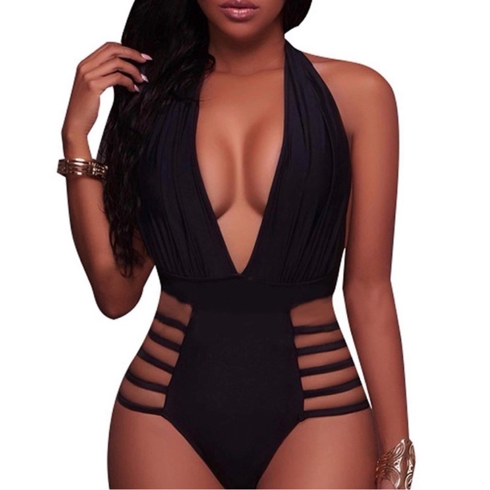 BeachQueen Black cut out one piece  suit . Size M never worn